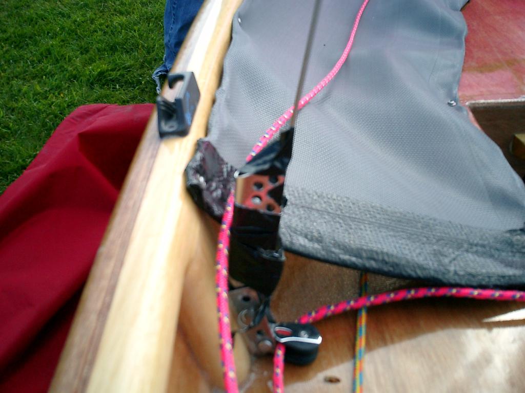 Using gaff tape to protect your sails. The metal bits on a boat, even some of the smoothest shackles have a habit of catching and tearing sails.
