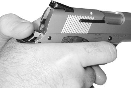 Remove the magazine from the firearm. Place the safety lever in the fully down fire position. Draw the slide back and eject any chambered round.