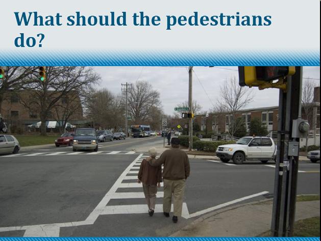 What should the pedestrians in this photo do to take control? There are several things. Give the audience time to answer A.