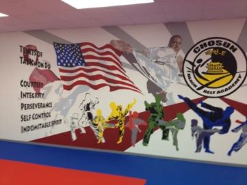 The new mural was unveiled at the belt ceremony