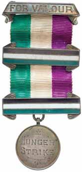$260 3805* Suffragette Medal 1909, engraved "Hunger / Strike", brooch bar suspension bar engraved "For Valour", two clasps, reverse of brooch bar impressed, "Toye. 57 Theobolds / Rd London".
