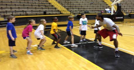Each day started with Coach Tyndall leading the campers in stretching exercises.