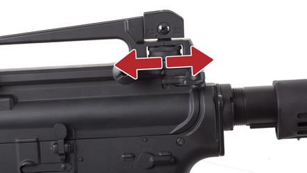 rear sight. To move the point of impact to the right, turn the knob clockwise.