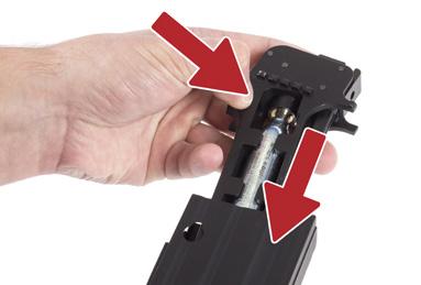 Install the assembled magazine into the rifle, take the rifle OFF SAFE, point the rifle in a