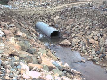 The expectation of the contractor with respect to fish passage was that because the pipe and causeway embankment were contained within the channel, the fish would pass through the pipe at low flows