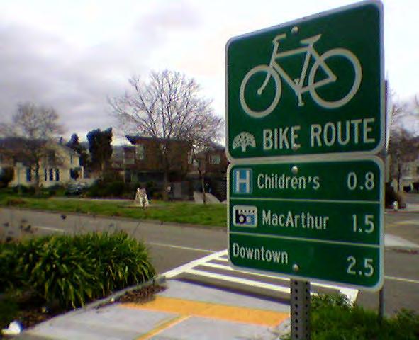 FURTHER CONSIDERATIONS Bicycle wayfinding signs also visually cue motorists that they are driving along a bicycle route and should use caution.