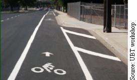 Figure 10: Right buffer dropped at intersection Bike lanes at intersections, driveways and alleys Since such a high percentage of bike/motor vehicle crashes happen at intersections, driveways and
