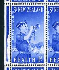22 New Zealand Postage Stamps Errors and Varieties 3d+1d Boys Brigade Main Sheet Errors and Varieties Horizontal blue lines appear through the stamps above the Scout s head.