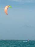 KITE SURFING Whether beginner or expert, Ambergris Caye is a great location for kite surfing! The shallow reef mile offshore creates a flat water paradise 20 miles long with No Crowds.