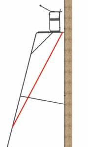 Using at least three adults, lean the ladder stand up into an upright position until the teeth make contact with the tree (see figure 41). 3.