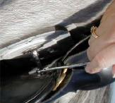 Loosen lock nut on rear fixing screw Adjust screw out to raise and in to lower With the saddle on the horse and not girthed up, and the horse standing on level ground, look at the stirrup bars to see