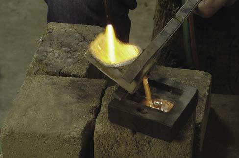 Pouring molten metal for the insert STEP 9: Create the Maker s Mark As an artist who s proud of his creation, I include a silver Maker s Mark on your
