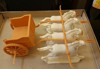 4. Place the yoke over the horses such that its v-slots are
