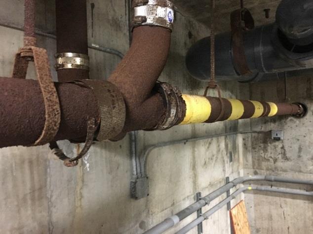 Directional arrows are provided on the exposed piping as per industry standards. The valves in the mechanical room have been replaced as necessary.