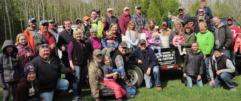 These members of the 250-member Bruce Peninsula Sportsmen s Association (BPSA) took time away from their Victoria Day weekend celebrations, to stock about 11-thousand yearling rainbow trout.