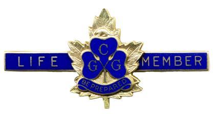 Blue enamel Trefoil logo with text CGG superimposed on gilt maple leaf and attached to blue enamel bar with text LIFE MEMBER. 5. Life Member 1959-1965. 1. H1015 2. POR (1966) 3.