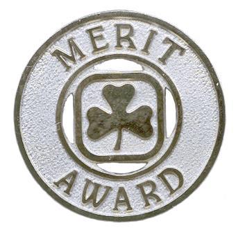 Merit Award 1. H1028 2. POR (1987) 3. 1987-1991 4. Blue enamel bar with text MERIT AWARD with gilt lettering and edging. 5. Certificate of Merit (1919-1987) Gold 1.