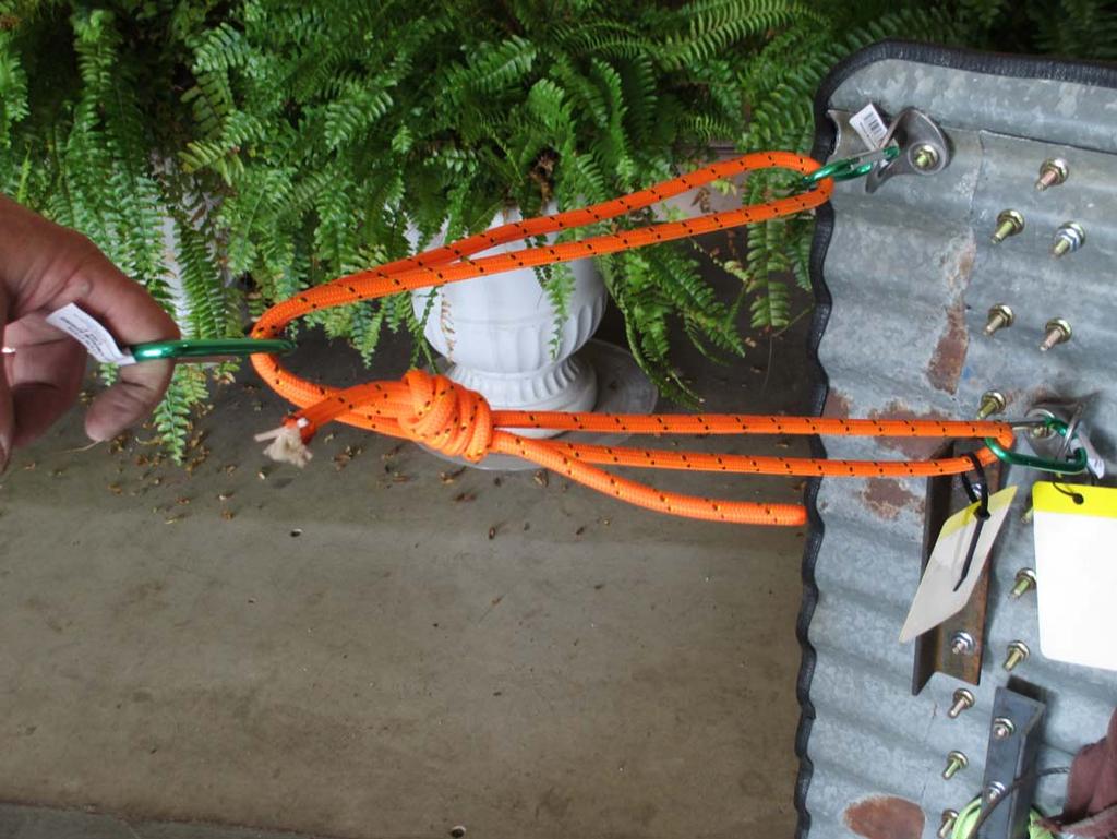 Tag 12, an 1800 pound rated anchor: An orange 8mm accessory cord that was pre tied by a fisherman knot into a sling.