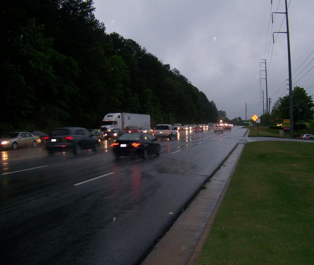 Hill Road from Old Norcross Road to Buford Highway and provided a grade separated interchange at