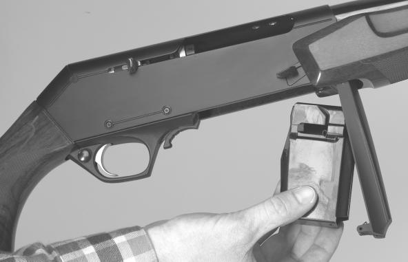 LOADING THE MAGAZINE WITH MAGAZINE DETACHED FROM FLOORPLATE Place the rifle in the on safe position and be sure the muzzle is pointed in a safe direction.