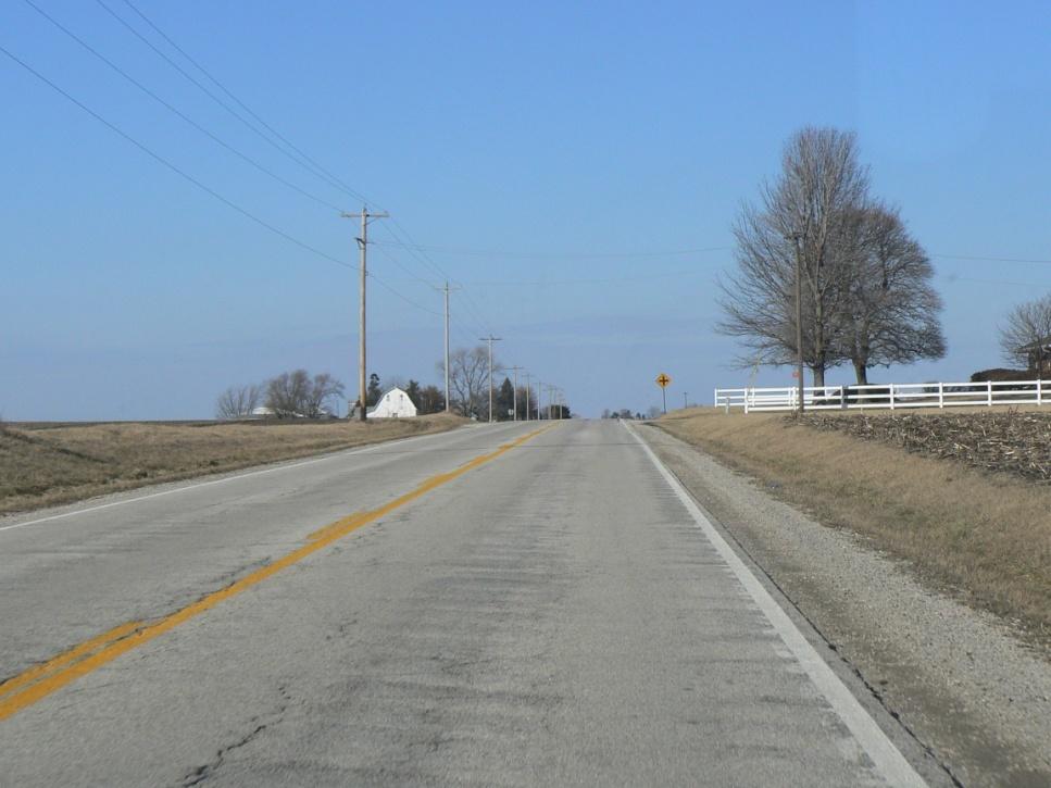 Issue: Absence of paved shoulder and rumble strips County Road 1 Champaign