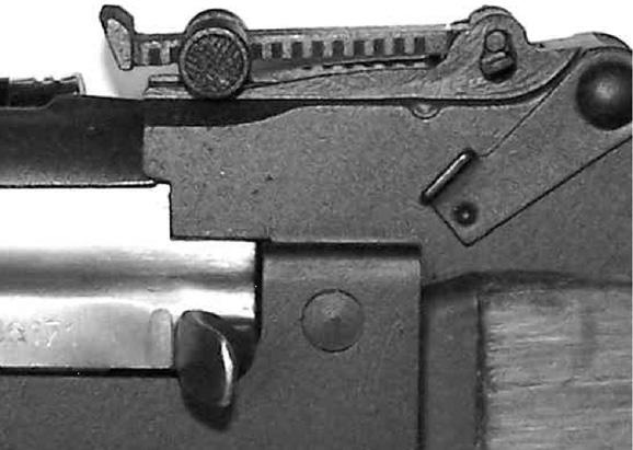 (See Illustration #3). 2. Remove the magazine by pressing forward on the magazine release lever while pulling the magazine out of the rifle. (See Illustration #5). 3.