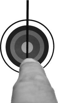 You will notice your index finger pointing at the bullseye is lined up with one of your eyes, this is your dominant eye and it controls your aim.