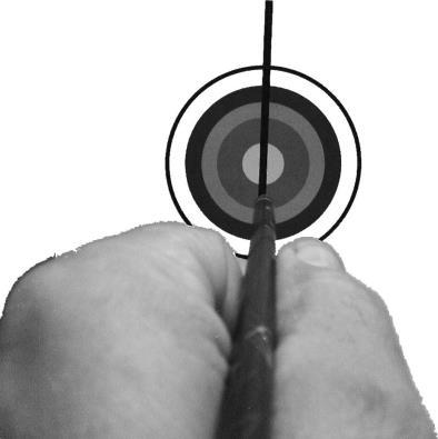 Alignment By bringing the arrow to anchor at your mouth notice the arrow is under your eye. This allows a peripheral view down the arrow's shaft to the target.