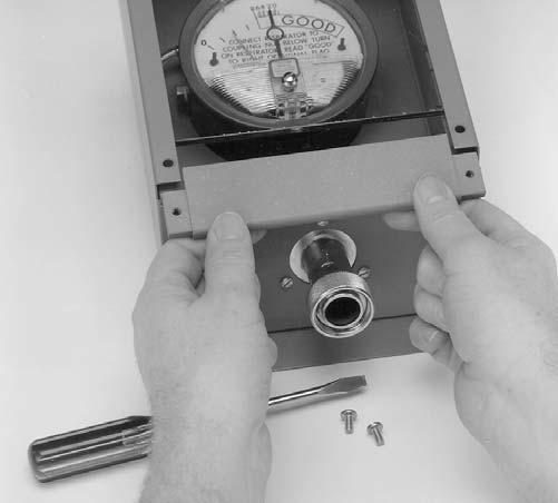The gauge reads good when the indicating needle is to the right of an adjustable signal flag.