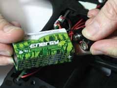 INSTALLING A 9V BATTERY Ensure that the Etek3 is switched off. Place the marker on a flat surface in front of you with the feed tube furthest away from you and the barrel pointing to the right.