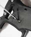 Then slide the OOPS off the T-slot. Remove the trigger assembly from the GRN frame as detailed in The Etek3 Trigger Assembly section of the maintenance chapter (See page 63-64).