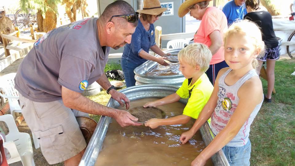 4) Gold Panning Sponsor The Gold Panning activities are perennial Encampment favorites! Black sand and gravel swirl as participants celebrate Death Valley's rich gold mining heritage.