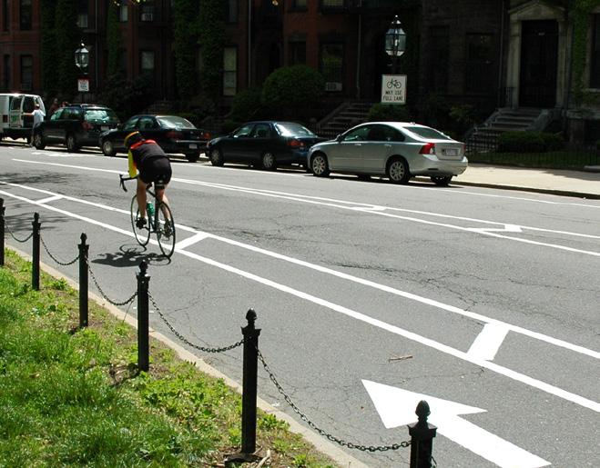 Contra flow lanes are bike lanes designed to allow bicyclists to travel in two directions on a one-way street, typically on lower volume, lower speed streets, for short distances such as a block or