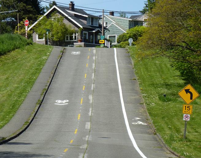 Advisory bike lanes are a bikeway type used to provide bicycle and motor vehicle connectivity on roadways with low motor vehicle volumes and speeds that are not wide enough to provide bike lanes and