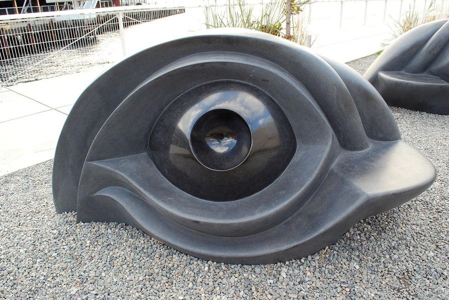 This is one of the "Eye Benches." You can sit on the flat part or on the back side of the eye!