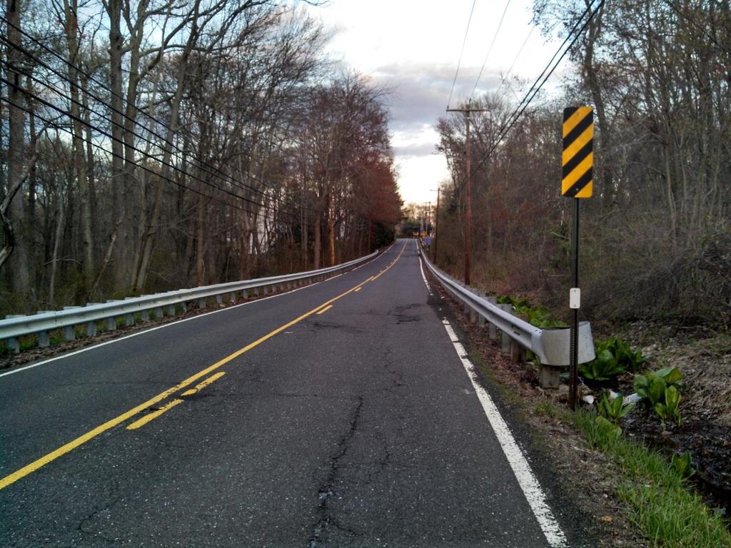 The width of Rt 571 outside of Roosevelt is narrower than the width of the Rochdale Avenue.