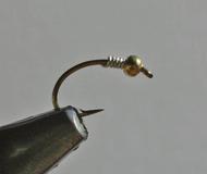 wire, size Brassie or Small Thorax: Peacock but variations on the pattern can use different dubbings Begin by wrapping wire behind the hook.
