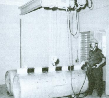 USING CHLORINE GAS Ton cylinders Stored horizontally Moved by mechanical means Bowl