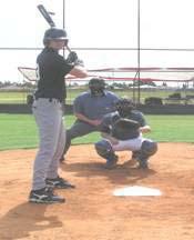The area to the catcher's right side is slot for a left handed hitter which is marked by the white line.