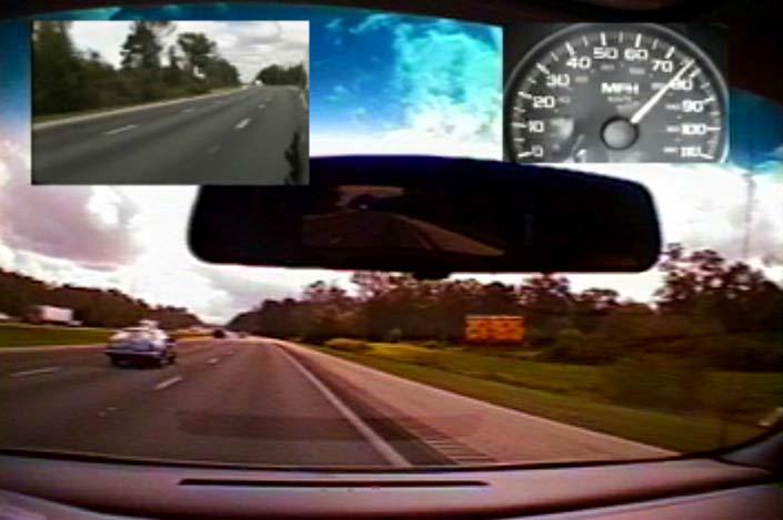 33 was placed in the upper left corner. The speedometer video was shown to the right of the rear-view mirror.