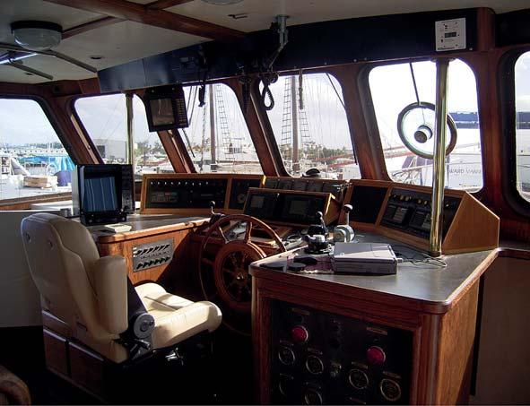 The Oceantide s well-equipped wheel house. The Oceantide s engine room.
