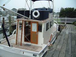 This owner has stored the trawler on land each winter. The trawler has been covered with shrink wrap or in the shed during the winters. Custom enclosed bow pulpit Ideal electric windlass. 35 lb.