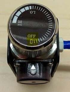 Hold the regulator in one hand, align the cartridge under the housing, and quickly turn it clockwise into the regulator. Do not stop until tight.