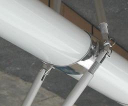The split rings should be towards the bottom of the mast.