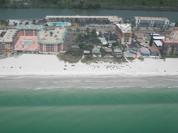 In winter, the shoreline retreats and the sandbar moves offshore. The sandbar moves onshore during the summer, nearly attaching to the shoreline in 2008 and 2010.