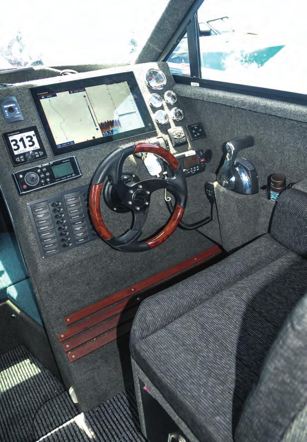 The helm bench seat is comfortable, with all instruments and controls close to hand.