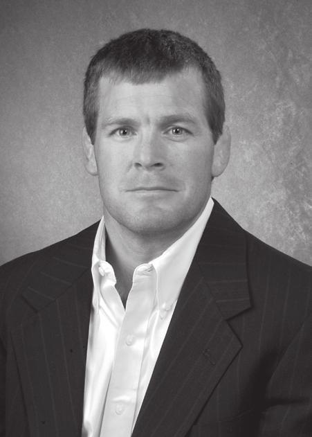 HEAD COACH TOM BRANDS Tom Brands Head Coach Three-time Big Ten Coach of the Year, Tom Brands, is in his fifth season as head wrestling coach at the University of Iowa.