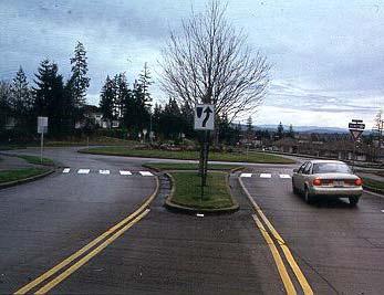 ROUNDABOUT Like traffic circles, roundabouts require traffic to circulate counterclockwise around a center island.