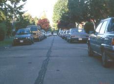 On-street parking is a practical way of decreasing the effective road width by allowing vehicles to park adjacent and parallel to the road edge.