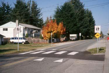 Raised crosswalks. A raised crosswalk is essentially a speed hump combined with a crosswalk. It provides the same benefits as a speed hump in slowing vehicles at the crossing.